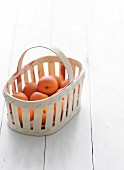 Apricots in a wooden basket