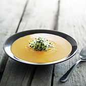 Pumpkin soup with sprouts