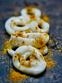 Raw calamaris sprinkled with Masala curry powder