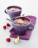 Cold beetroot soup with raspberries and lime cream