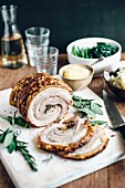 Rolled pork breast with herbs