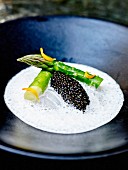 Bass in buttermilk cream, caviar and green asparagus