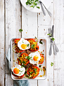 Red peppers stuffed with rice and fried eggs