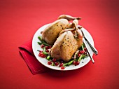 Roasted quail, green beans with pomegranate seeds