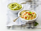 Mashed potatoes with diced tomatoes and mashed green vegetables with basil