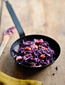 Pan-fried red cabbage and diced bacon