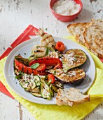 Plate of grilled vegetables with grated parmesan