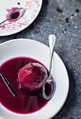 Pears poached in spicy red wine
