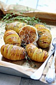Whole sliced potatoes roasted with garlic and thyme