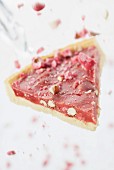 Slice of pink praline tart