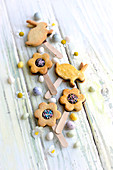 Flower and rabbit-shaped Easter chocolate shortbread lollipops