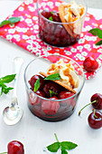 Pan-fried cherries, galette Breton and whipped cream and toffee sauce