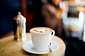Cappuccino on a table in a café