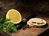 Oat crackers, peppercorns, lemon and parsley