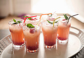 Red fruit cocktails with mint