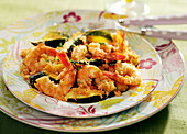 Sauteed shrimp and zucchini with tomato paste and coconut