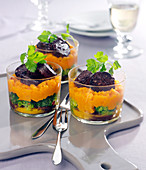 Black pudding with carrot and broccoli puree