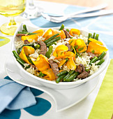 Rice sauté with beef, green beans and thinly sliced carrots