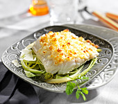Ling fillet grilled with parmesan, tender leeks