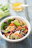 Salad with smoked salmon, blueberries, cherry tomatoes and fennel