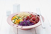 Tuna Poke with raw vegetables and quinoa