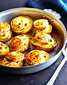 Potatoes stuffed with goat's cheese and raw ham