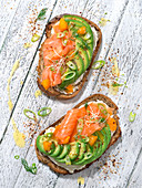 Cream cheese, avocado, smoked salmon, marinade, spring onion and rocket lettuce sprout toasts