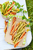 Two pesto twist finger appetizers outdoors
