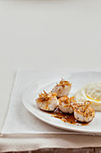 Pan-fried scallops with fried ginger threads,Mashed root celery