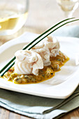 Rolled whiting fillets with seafood sauce