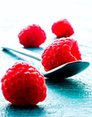 Raspberries and spoon