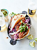 Red cabbage and crisp chicken tacos