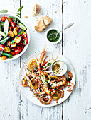 Langoustines roasted with herbs and lemon,cherry tomato and mini cucumber salad