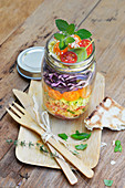 Mixed semolina savoury salad in a jar