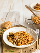 Iberischer Reis mit Schweinskoteletts und Artischocken