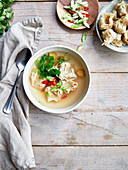 Asian ginger broth with ground beef Wontons