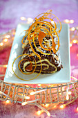 Chocolate,almond and caramel twirl Christmas log cake