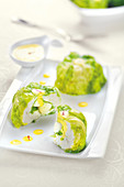Small cabbages stuffed with fish and scallops