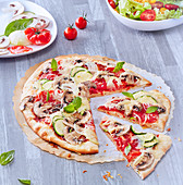 Tomato,mushroom and courgette pizza