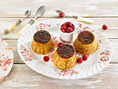 Flan-style puddings with fresh raspberries