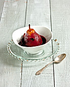 Pear poached in spicy red wine