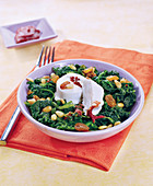 Spinach Sauté With Pine Nuts,Raisins And Goat's Cheese With Tomato Coulis