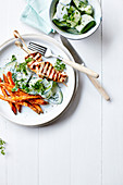 Grilled chicken brochettes,sweet potato chips and cucumber yoghurt