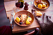 Rabbit with potatoes and prunes