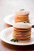 Pancakes with mint and powdered sugar