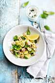 Potato salad with cockles, spinach and lemon dressing