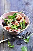 Fig,Parma ham, sheep's milk cheese and sprout salad