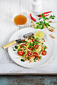 Green mango salad with peanuts,peppers and coriander