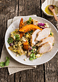 Chicken breast with couscous, chicory and pumpkin