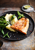 Salmon fillet with honey and ginger served with beans and mashed potatoes